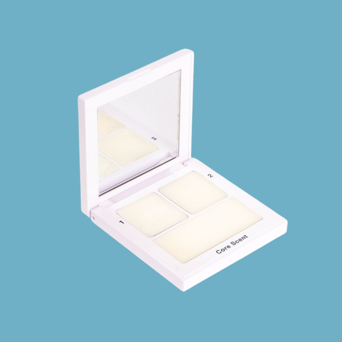 A minimalist desk with a lamp, plant, laptop, notebooks, and coffee beans.