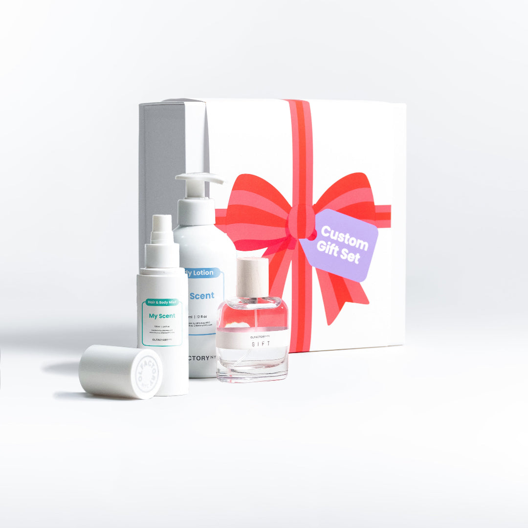 A minimalist desk with a lamp, plant, laptop, notebooks, and coffee beans.