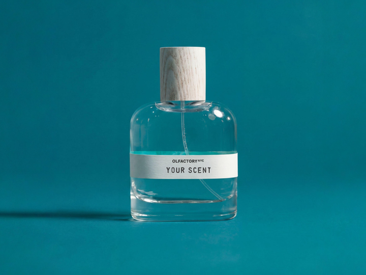 Custom fragrance bottle in branded packaging