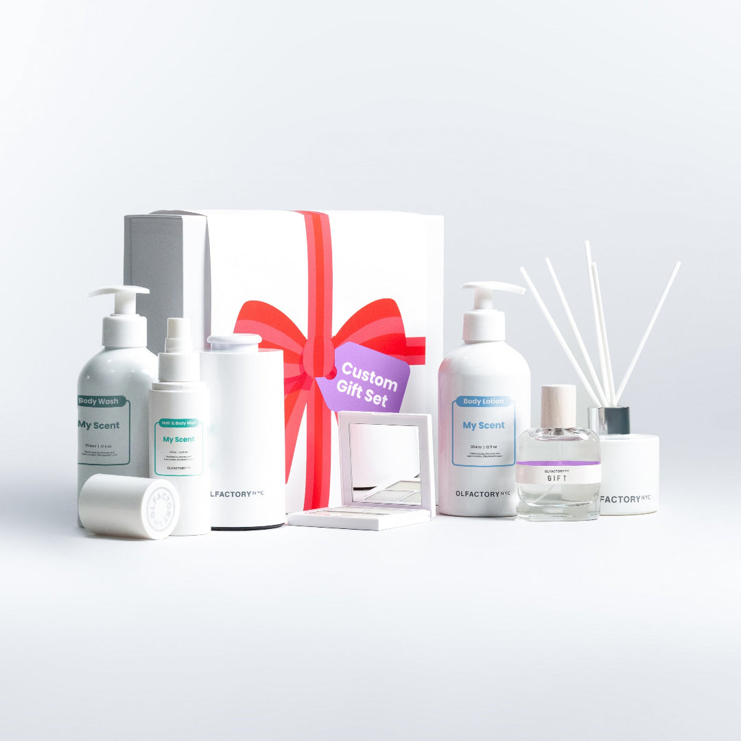 A minimalist desk with a lamp, plant, laptop, notebooks, and coffee beans.